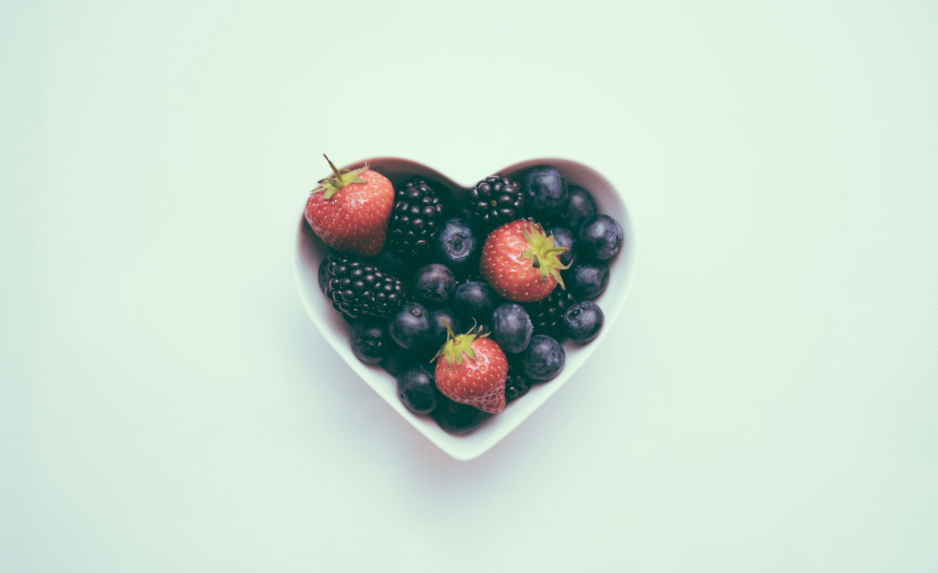 https://unsplash.com/photos/heart-shaped-bowl-with-strawberries-tb5A-QTI6xg?utm_content=creditCopyText&utm_medium=referral&utm_source=unsplash