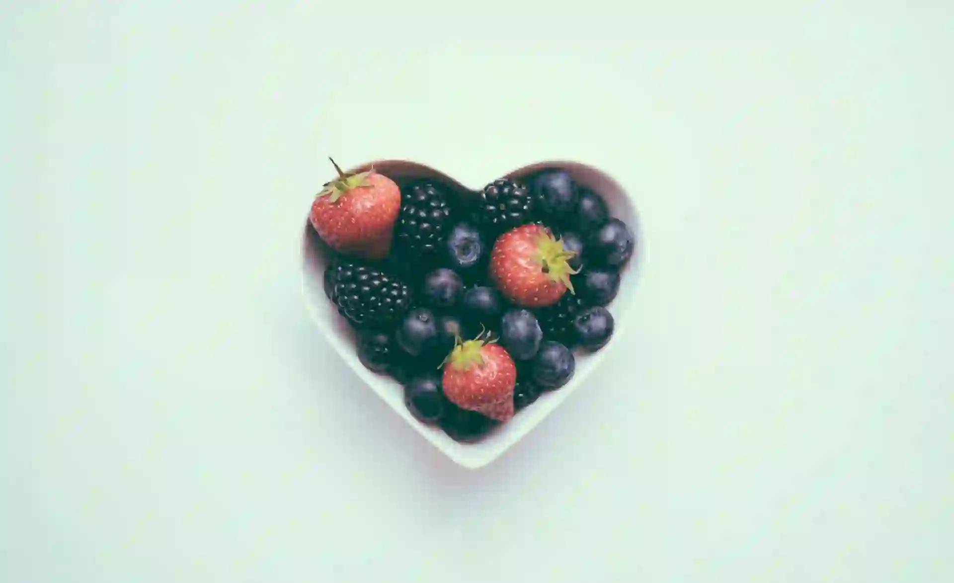 https://unsplash.com/photos/heart-shaped-bowl-with-strawberries-tb5A-QTI6xg?utm_content=creditCopyText&utm_medium=referral&utm_source=unsplash